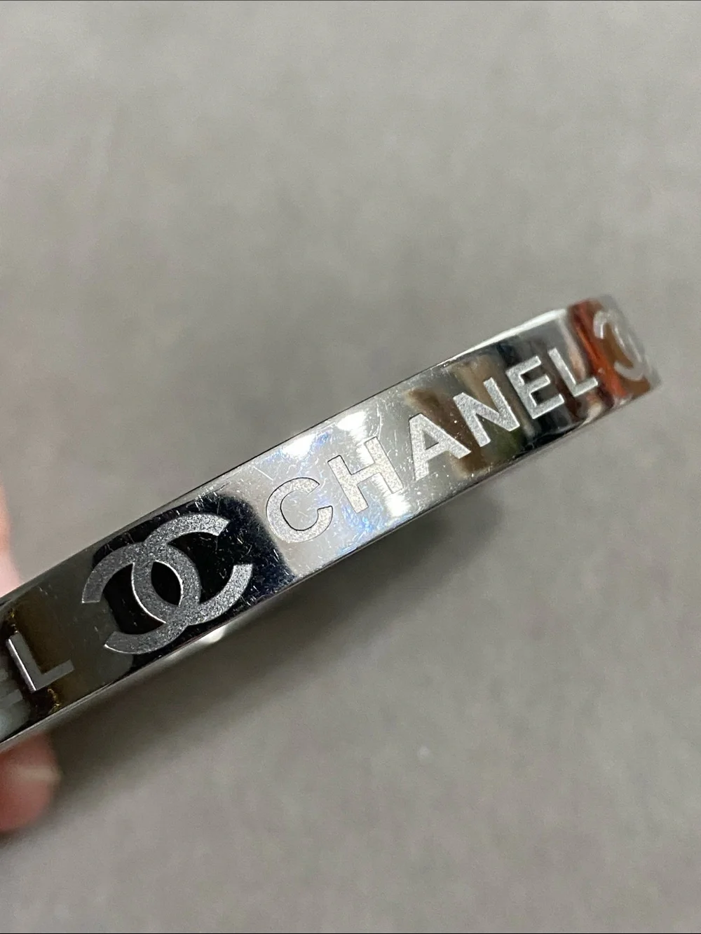 CHANEL Silver-Tone Logo Slim Bangle